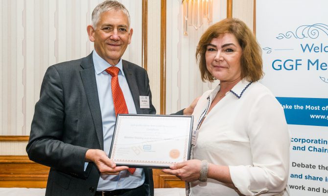 GGF CEO Kevin Buckley presents Abigail Chapman of Slimline Glazing with GLASS Charter Bronze Level Certificate