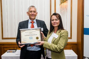 GGF CEO Kevin Buckley presents Katie Thornton of The Window Company (Contracts) Ltd with GLASS Charter Gold Level Certificate
