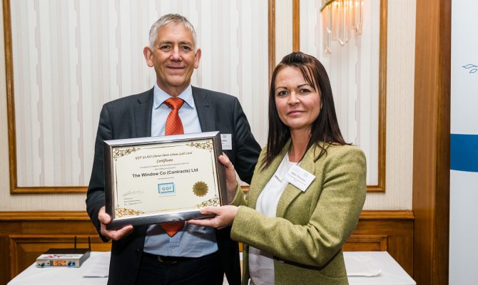 GGF CEO Kevin Buckley presents Katie Thornton of The Window Company (Contracts) Ltd with GLASS Charter Gold Level Certificate
