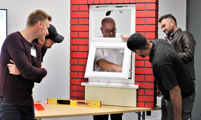 GGF Installer Training Course attendees examine a window installation